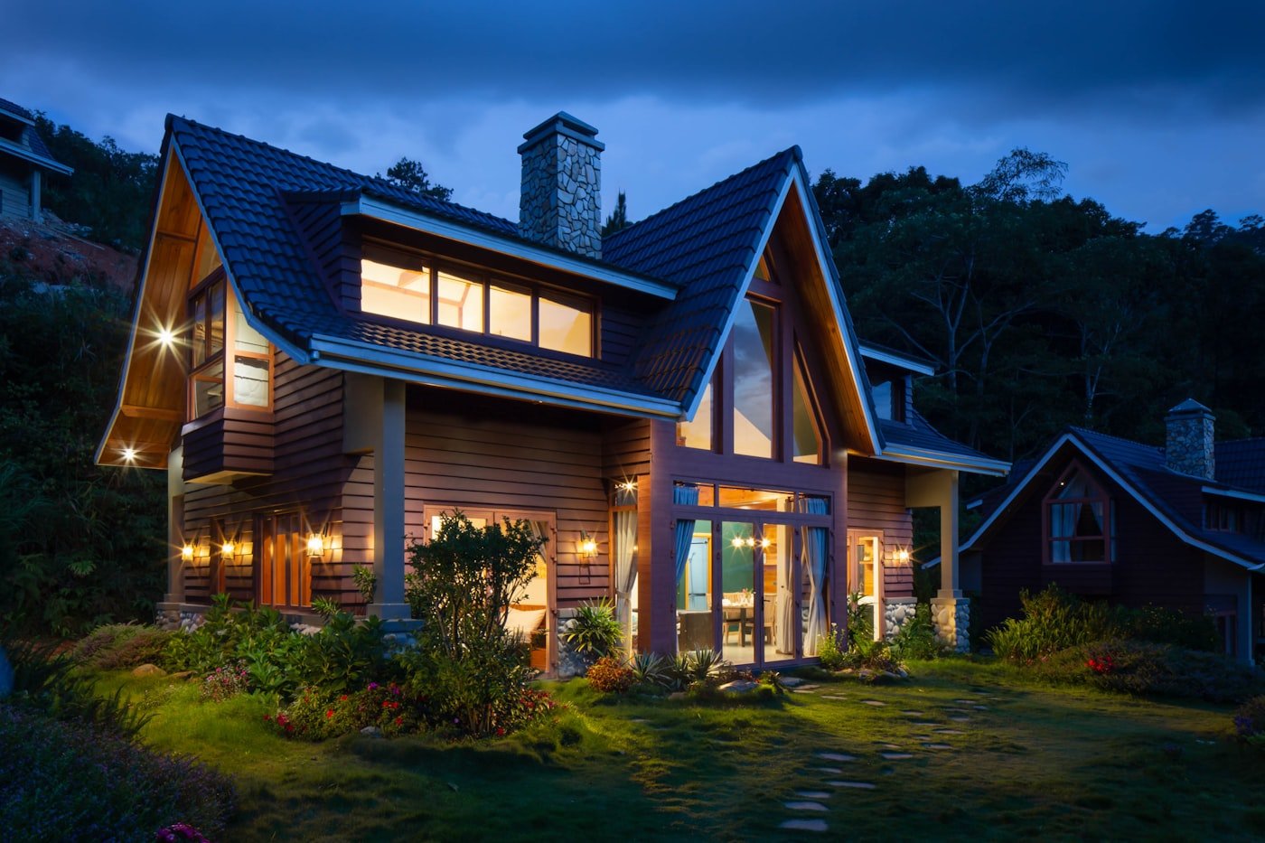 A warmly lit, energy-efficient Coventry home at dusk